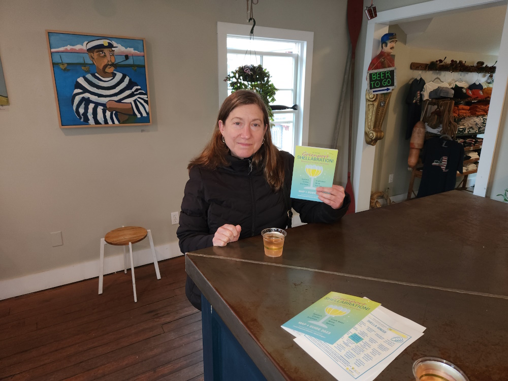 Marian starts us off in the Greenport Brewery, enjoying a glass of rose.